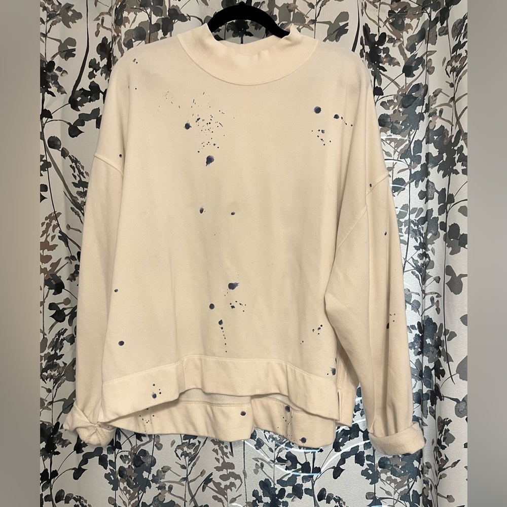 White and blue sweater